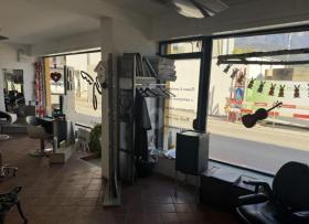 Winkel op te koop in Melide, Zwitserland Winkel op te koop in Melide, Zwitserland