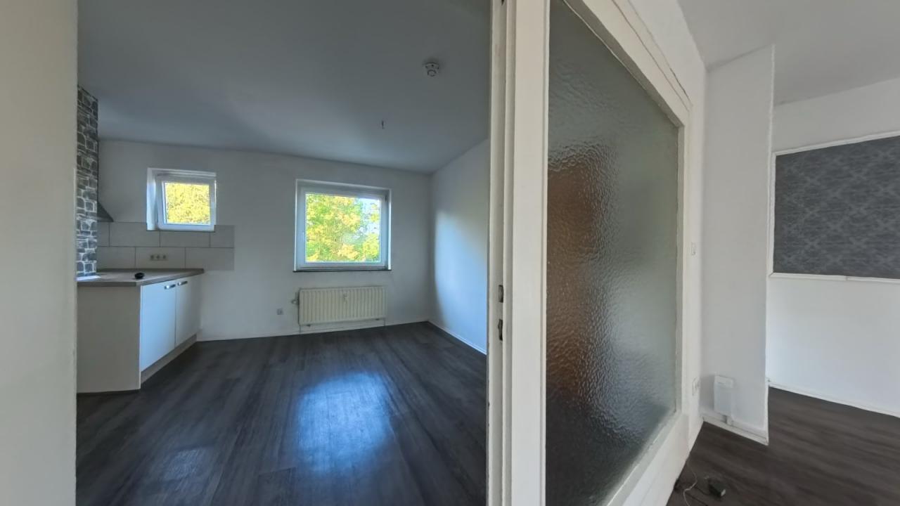 Blick aus dem Wohnzimmer in die Eingangsdiele